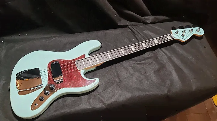 Обзор сборки китайской реплики Fender JazzBass бирюзовый с крышками